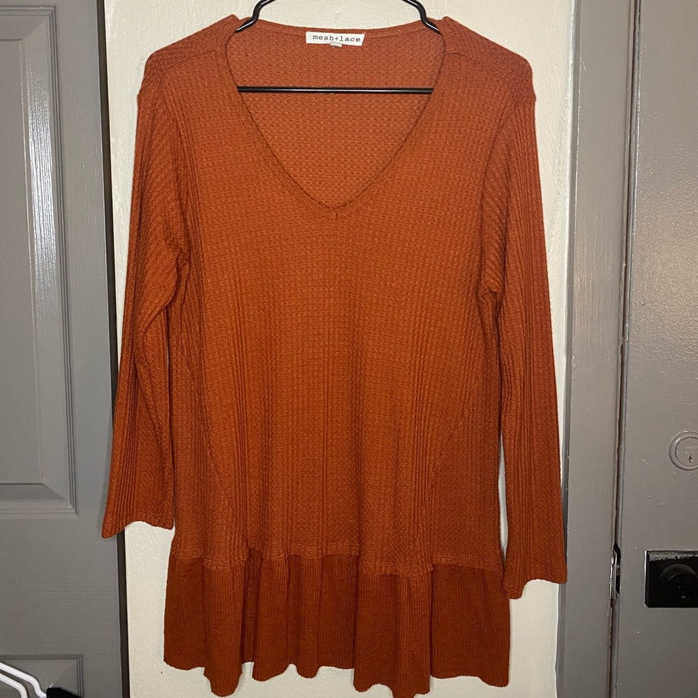 orange sweater